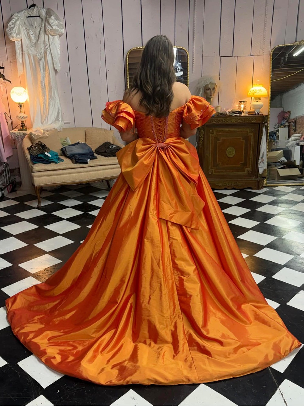 Off-Shoulder Orange Ball Gown with Statement Bow